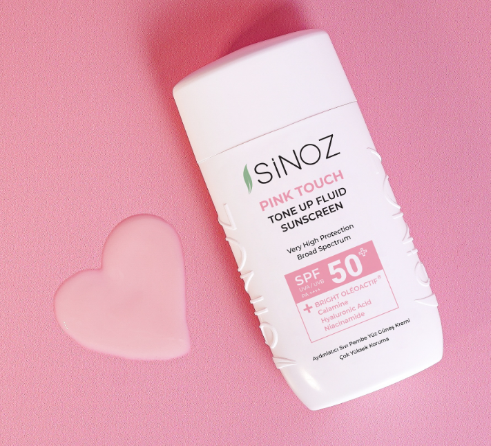 SiNOZ Pink Touch Tone Up Fluid Sunscreen SPF50 - 50ml | سينوز واقي شمسي سائل مع توهج وردي spf50 - 50 مل